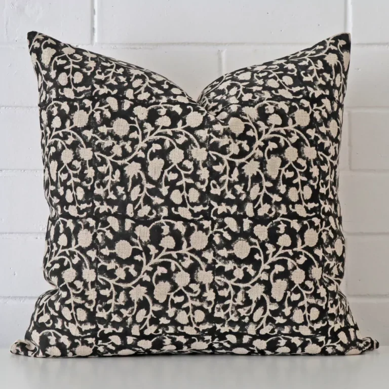 Gorgeous square designer cushion cover that has a graceful floral design.