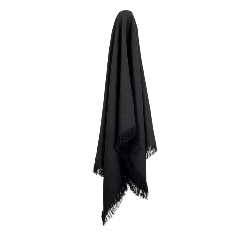 A linen throw hanging on a hook that has an elegant black colour.
