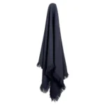 A navy linen throw hanging down.