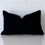 An elegant outdoor cushion cover in a stylish rectangle size with black colouring.