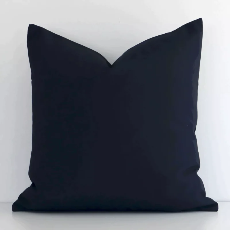 byron-waterproof-black-outdoor-cushion-cover---sc694-45 Lovely black solid-coloured cushion made from outdoor fabric and in an elegant square shape.