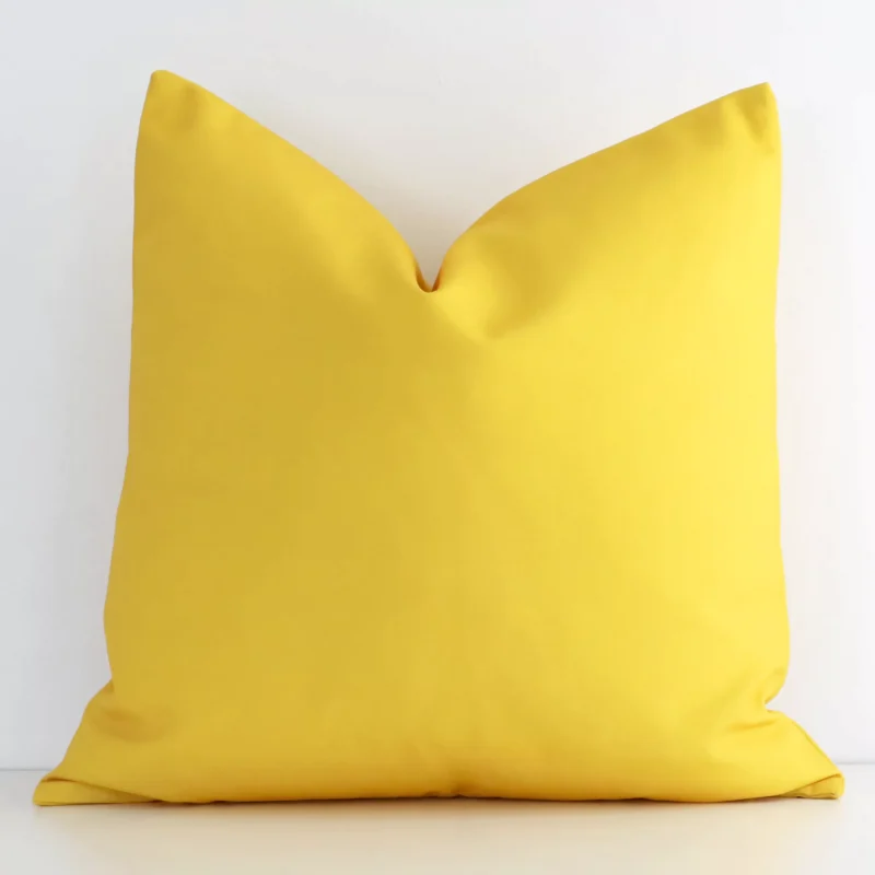 byron-waterproof-yellow-outdoor-cushion-cover---sc726-45 An eye-catching outdoor square cushion cover featuring a hue that is yellow. It has a solid-coloured style.