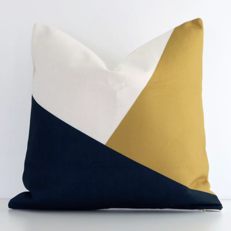 asta-black-and-gold-cushion-cover---45cm-x-45cm---sc268-45 A lovely square colourful cushion cover arranged in front of a white wall. The geometric style complements the linen material.