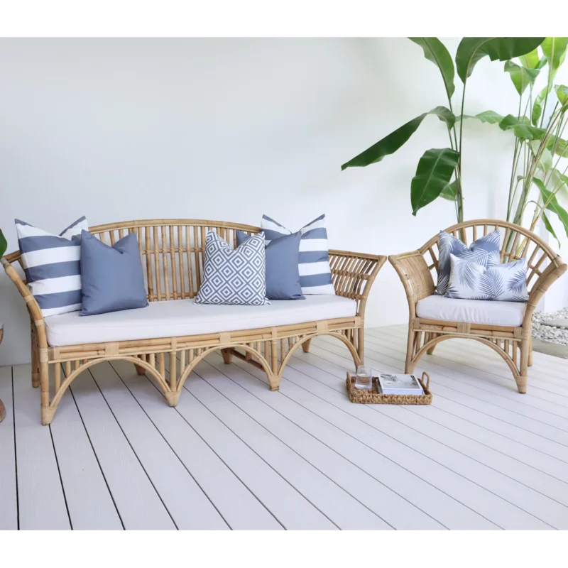 Byron Grey Outdoor Lounge Cushions Set - 7 Covers - COLO1196 7 grey cushions with various designs arranged on rattan seats in front of a white wall.