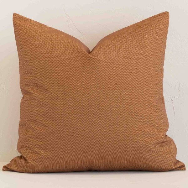 A gorgeous outdoor large cushion in tan colour. It has an eye-catching geometric design.