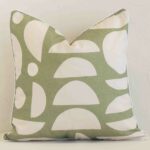 Front view of geometric square cushion. Crafted from a special outdoor material in a sage colour.