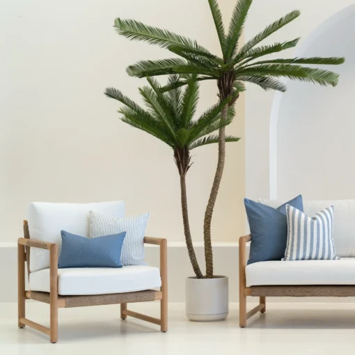 Outdoor living area showcasing 4 outdoor cushions in a pacific blue colour.