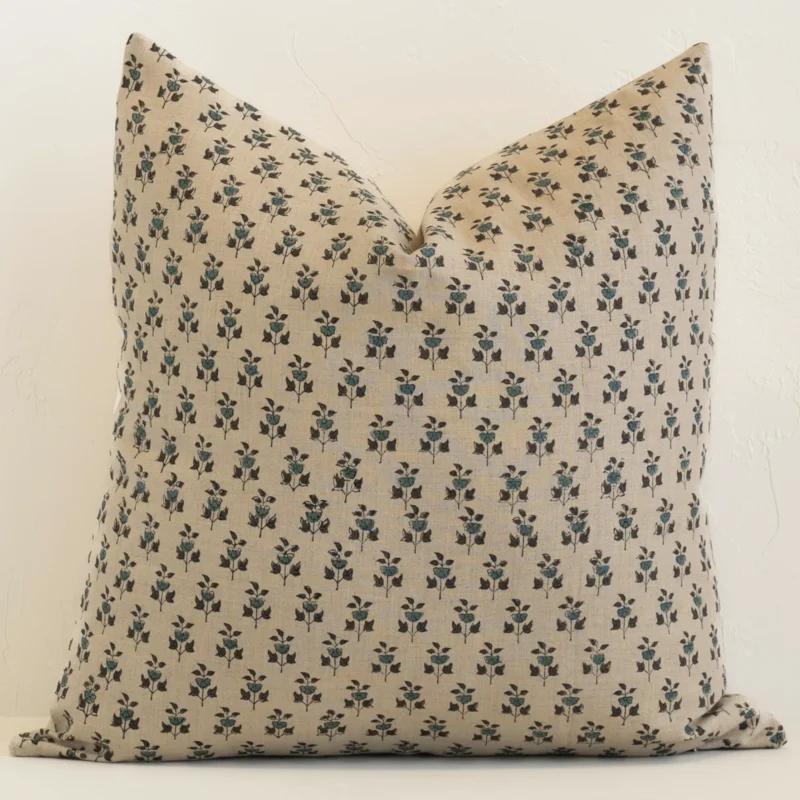 An eye-catching linen large cushion cover featuring a sand hue. It has a unique floral style.
