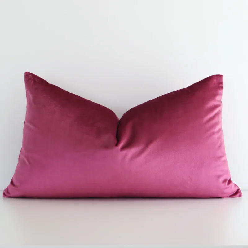 A superior velvet blush cushion cover yielding a solid-coloured style and in a classy rectangle size.