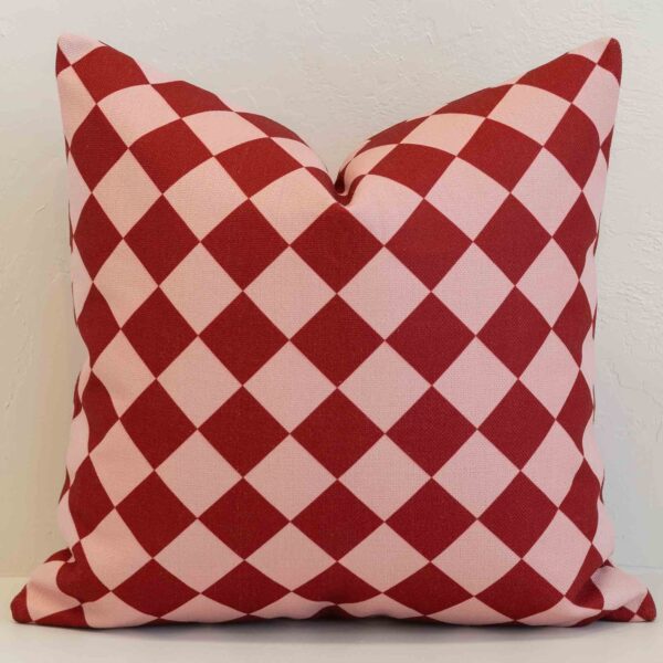 Diamond gingham cushion cover with a classic check design in rich red and soft blush.