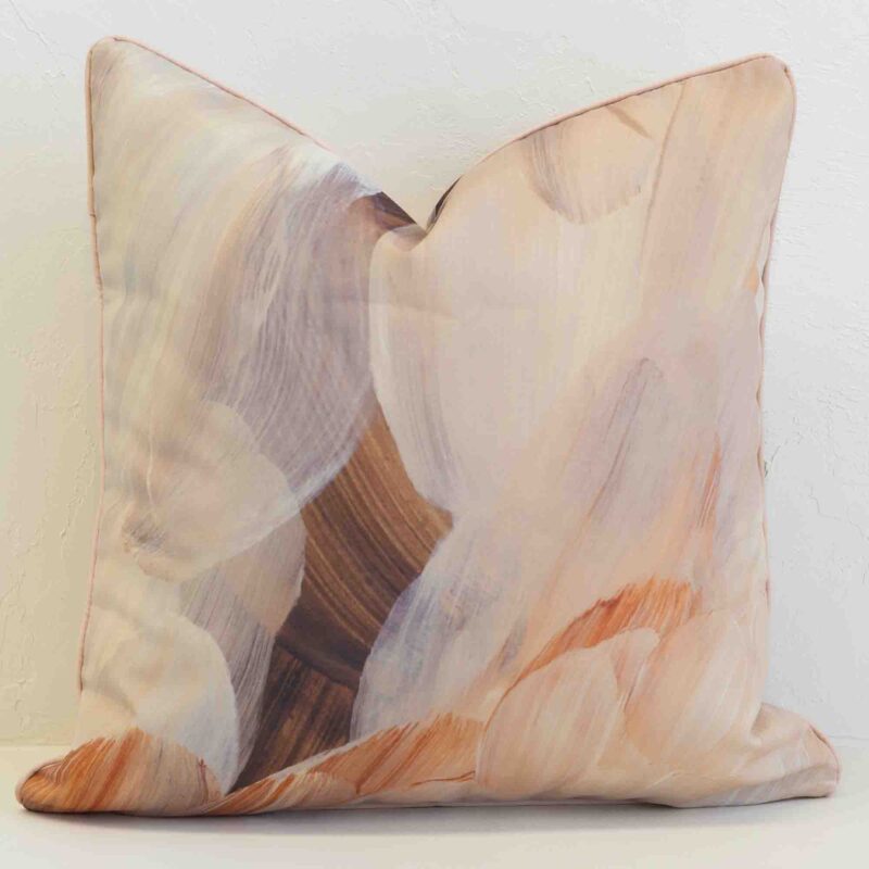 Abstract outdoor cushion cover in soft earthy hues, blending painterly textures for a calm and contemporary look.