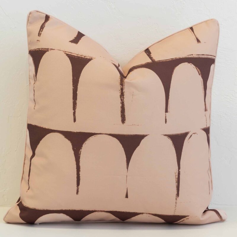solterra-arch-waterproof-outdoor-cushion-cover---sc1157-45 Waterproof outdoor cushion cover featuring a soft arch pattern in warm clay and chocolate tones, creating a bold yet relaxed statement.