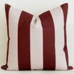 Large mulberry and blush pink striped cushion cover.