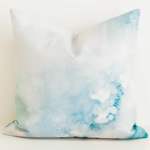 Cushion cover with aqua watercolour floral print.